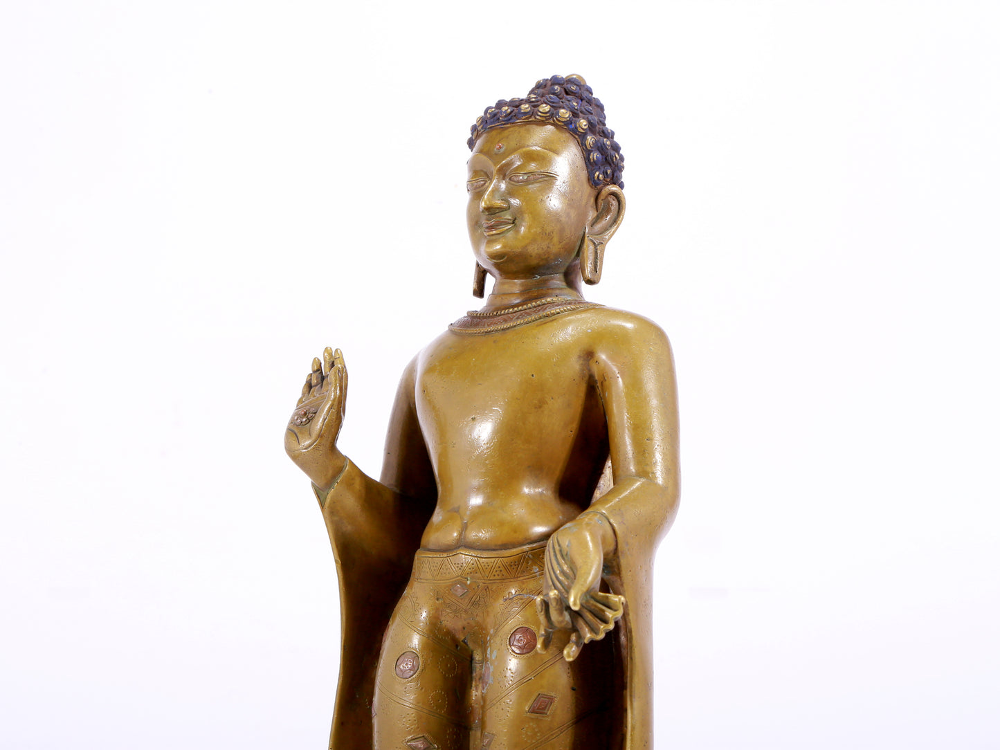 A solemn alloy copper inlaid silver statue of Gautama Buddha