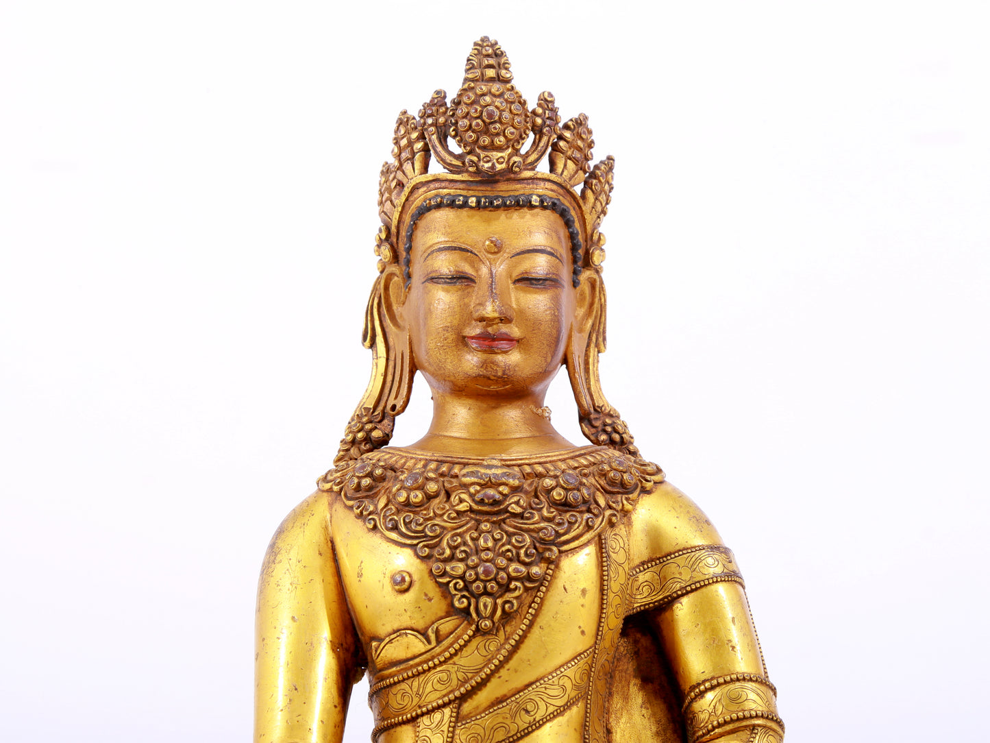 A solemn gilt bronze statue of Bodhisattva