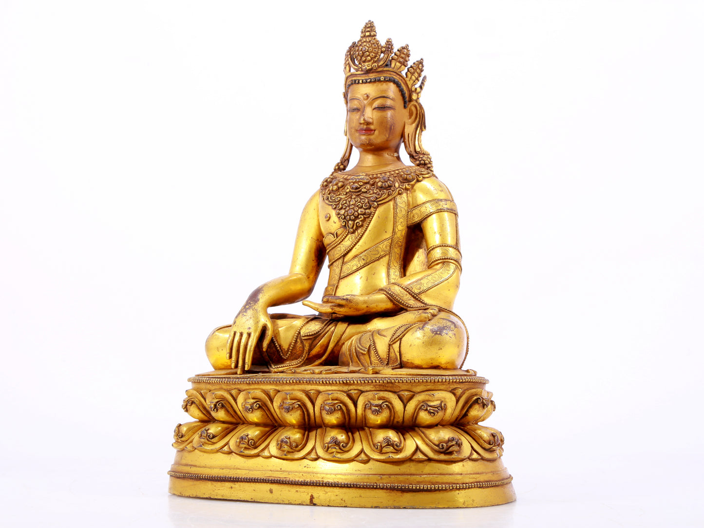 A solemn gilt bronze statue of Bodhisattva