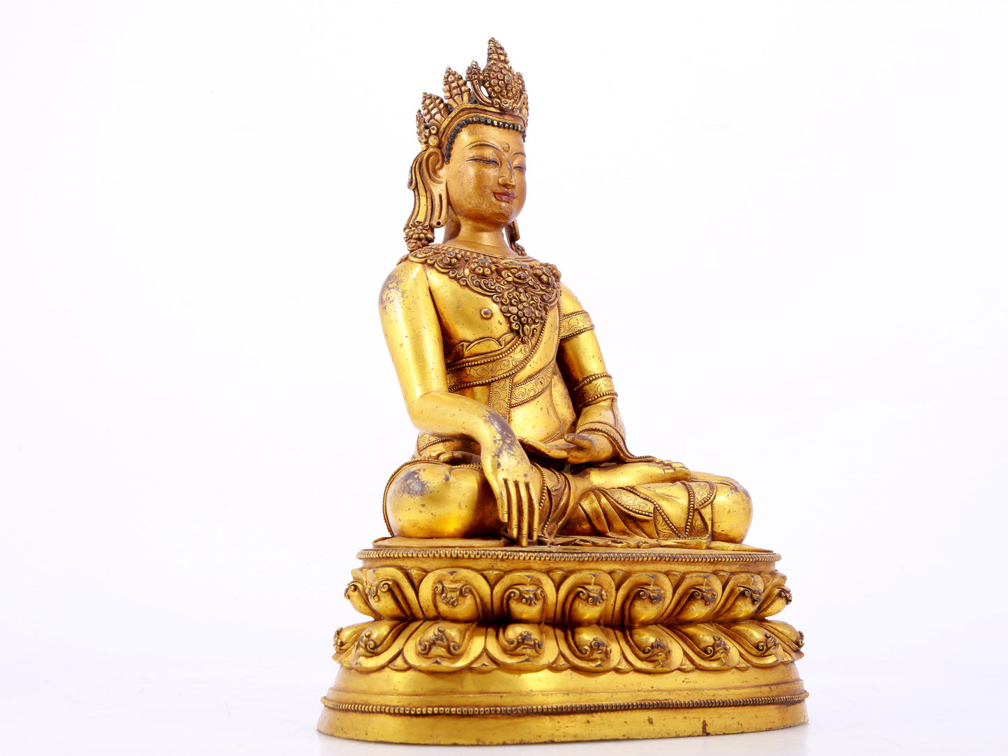 A solemn gilt bronze statue of Bodhisattva