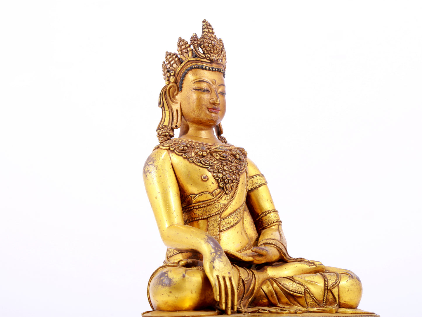 A solemn gilt bronze statue of Bodhisattva