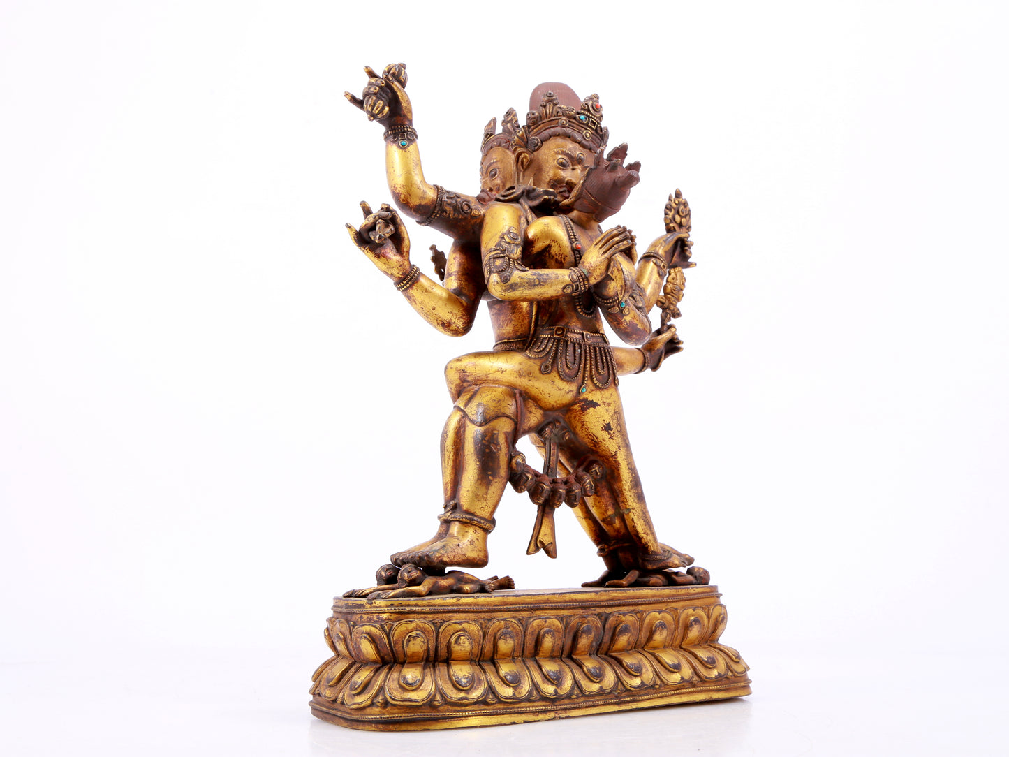 A majestic gilt bronze statue of the joyful Buddha