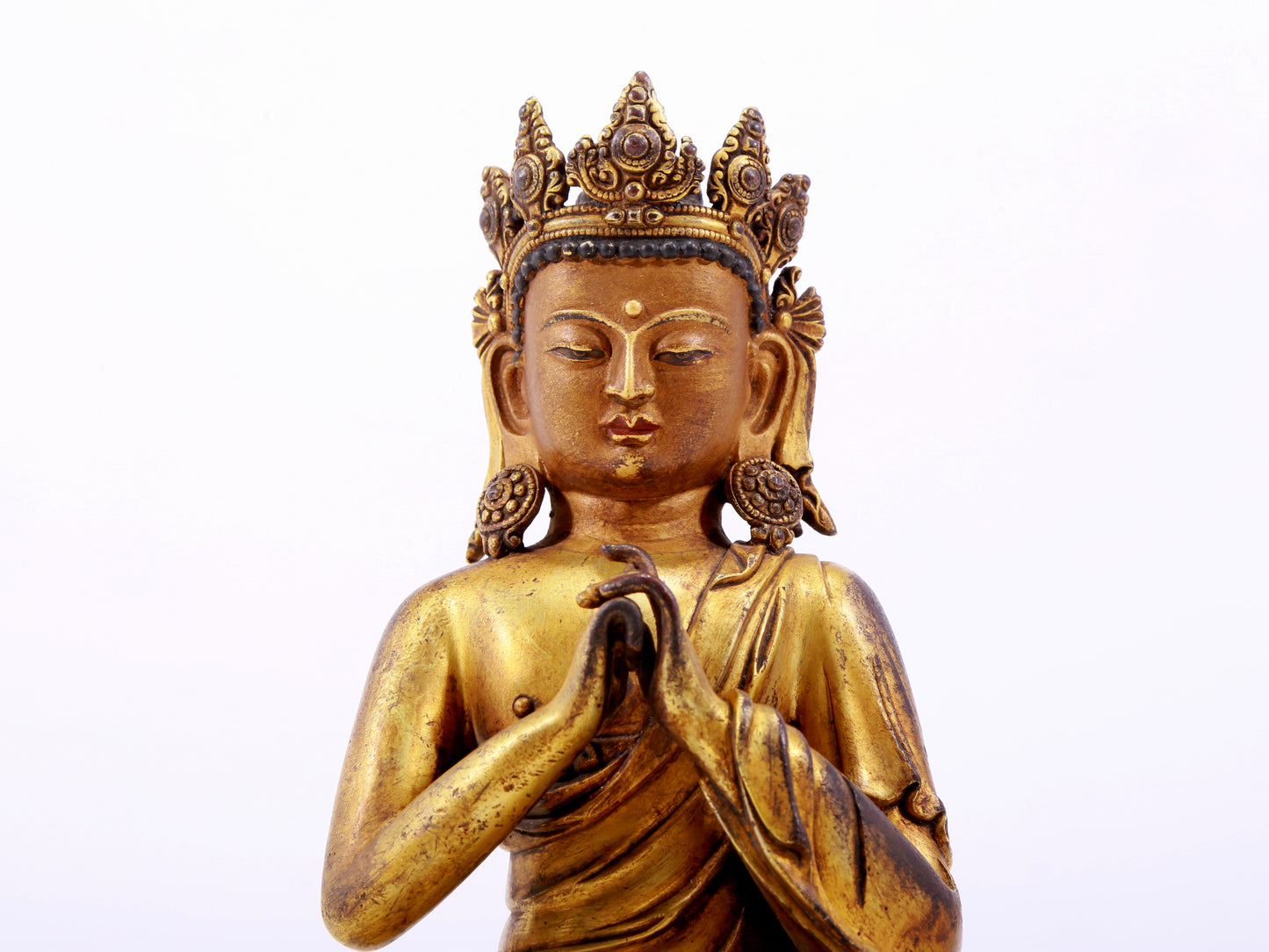 A solemn gilt bronze statue of Bodhisattva