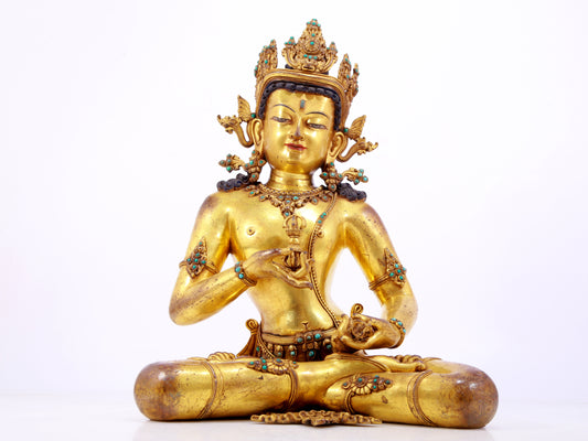 A solemn gilt bronze statue of Vajrasattva inlaid with turquoise