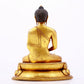 A majestic gilt bronze statue of Sakyamuni