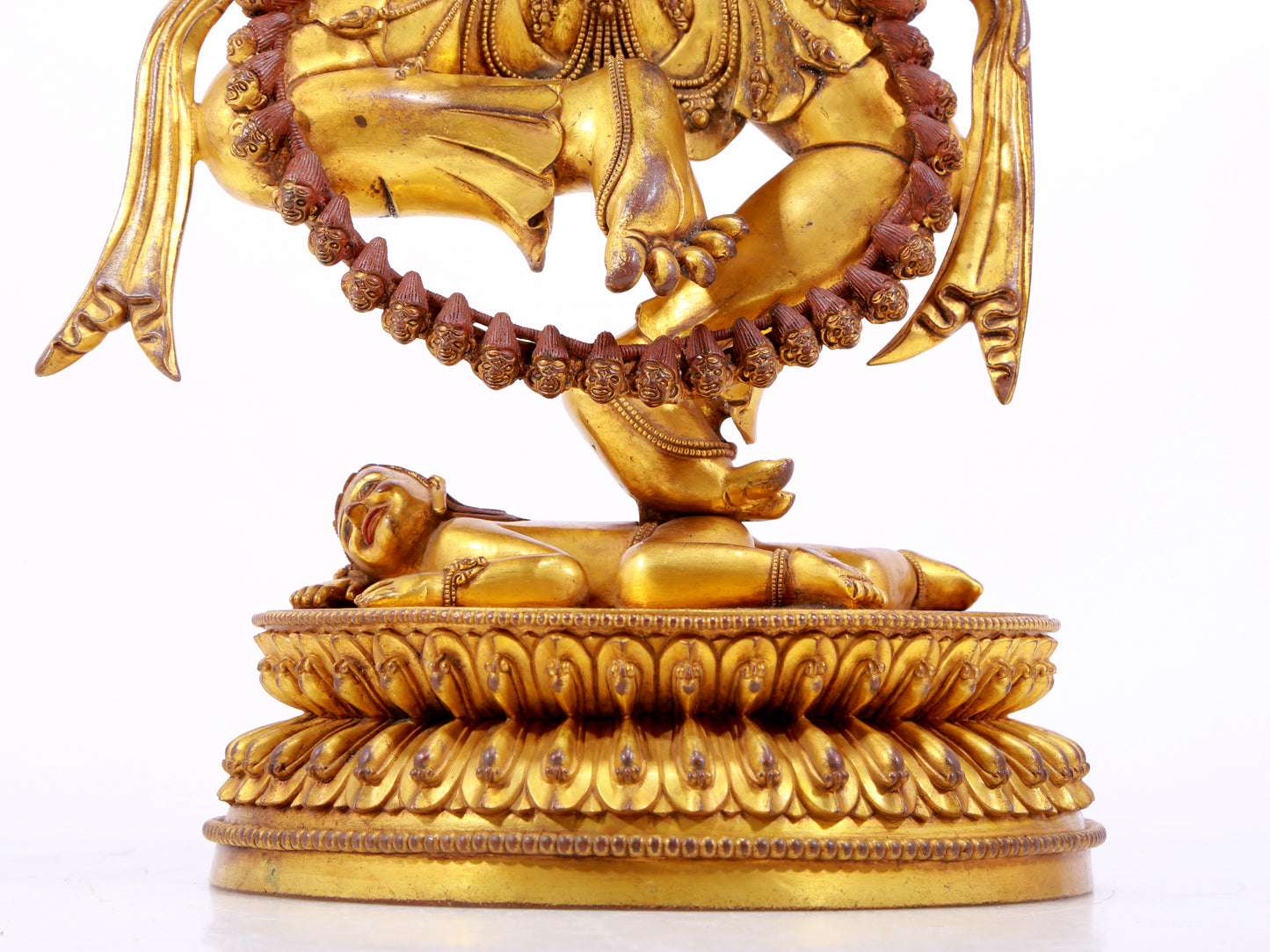 A solemn gilt bronze statue of the God of Wealth