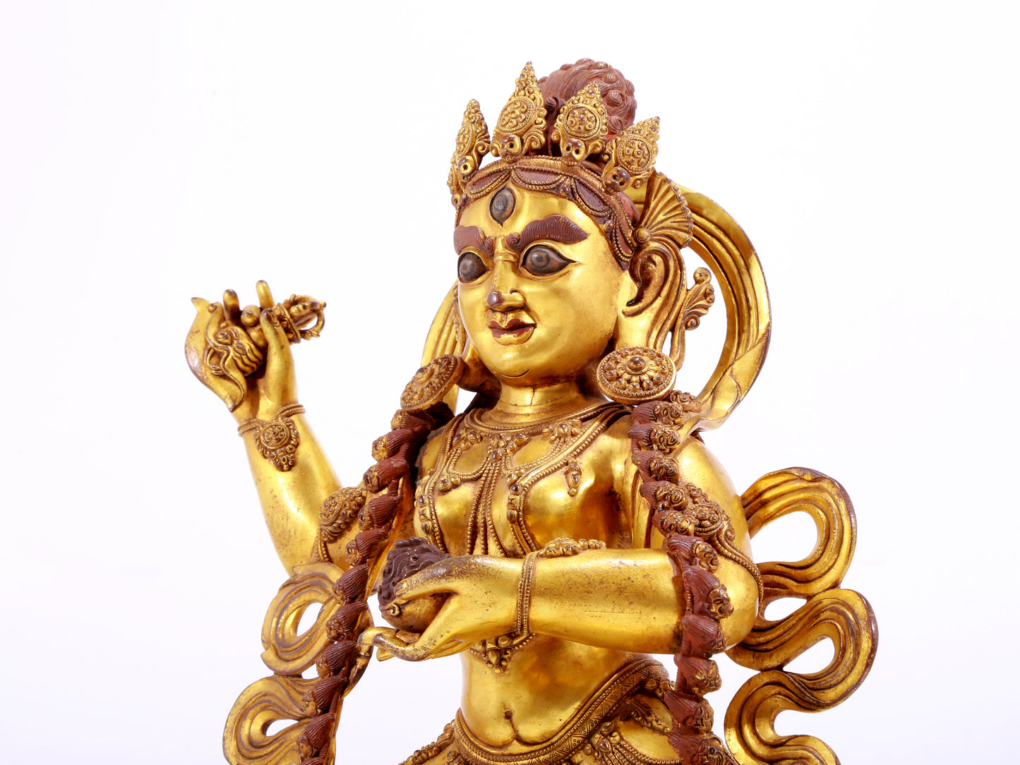 A solemn gilt bronze statue of the God of Wealth