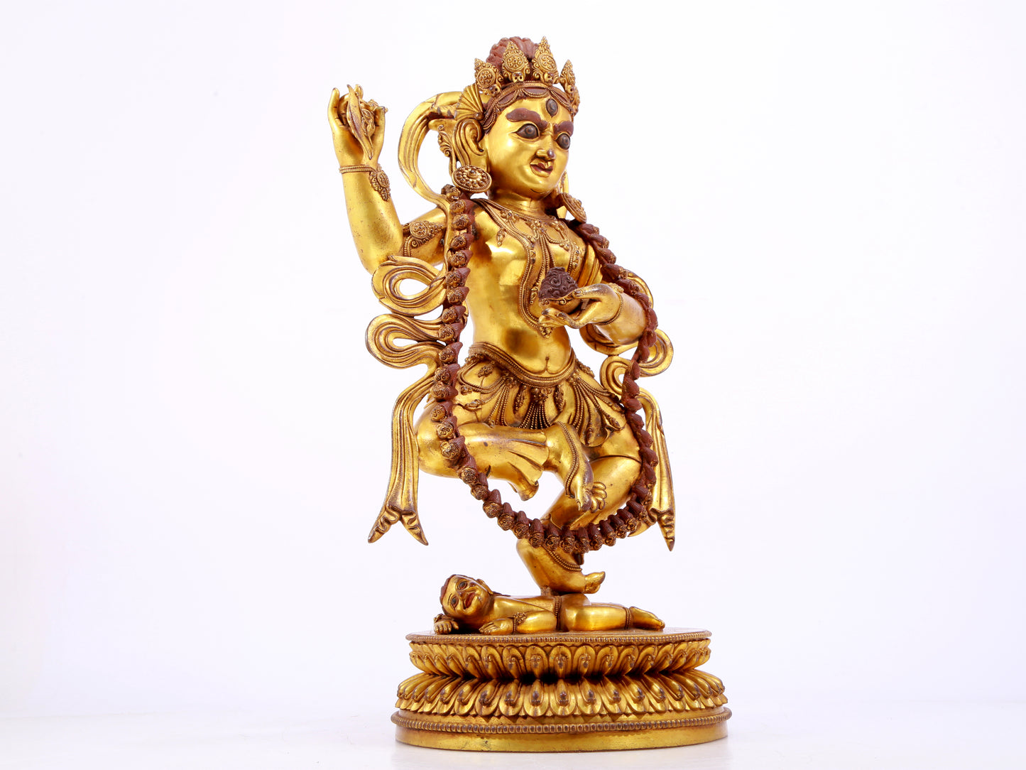 A solemn gilt bronze statue of the God of Wealth