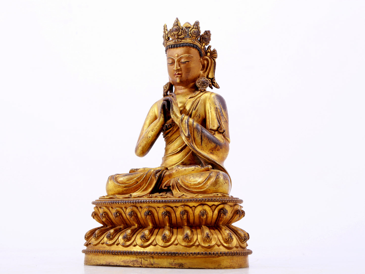 A solemn gilt bronze statue of Bodhisattva