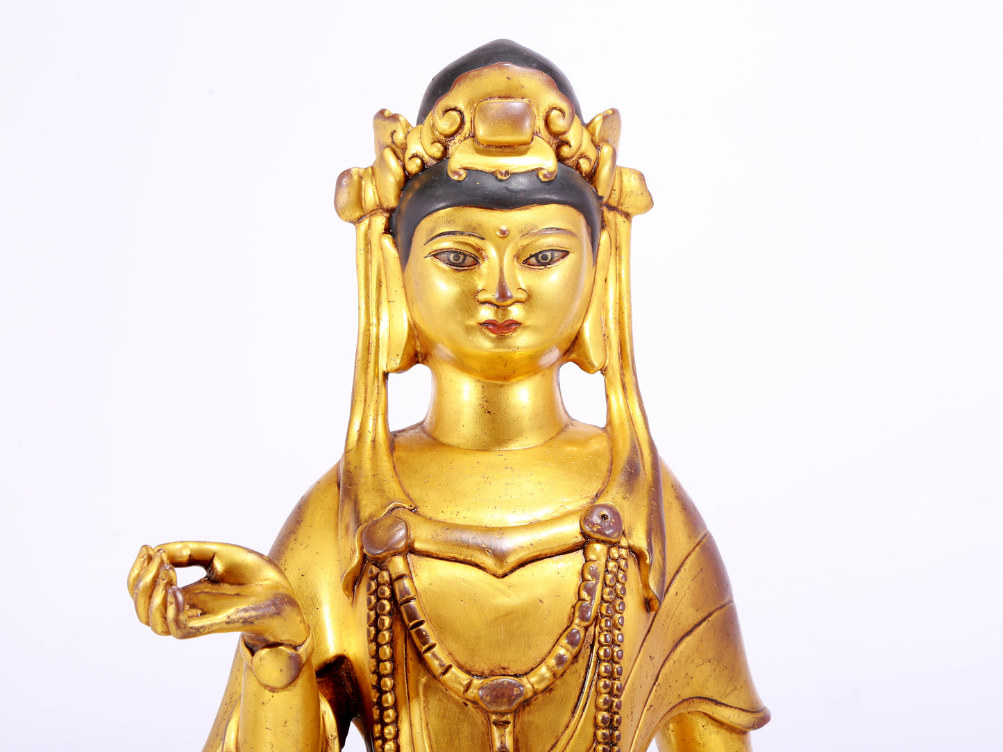 A majestic gilt bronze statue of Guanyin