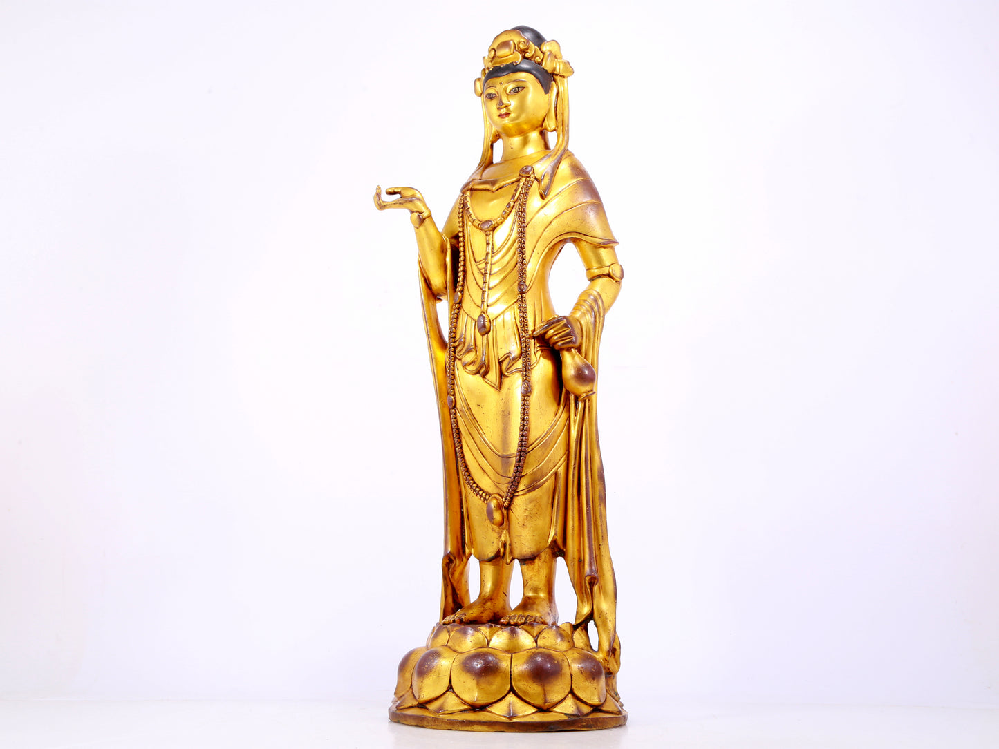 A majestic gilt bronze statue of Guanyin