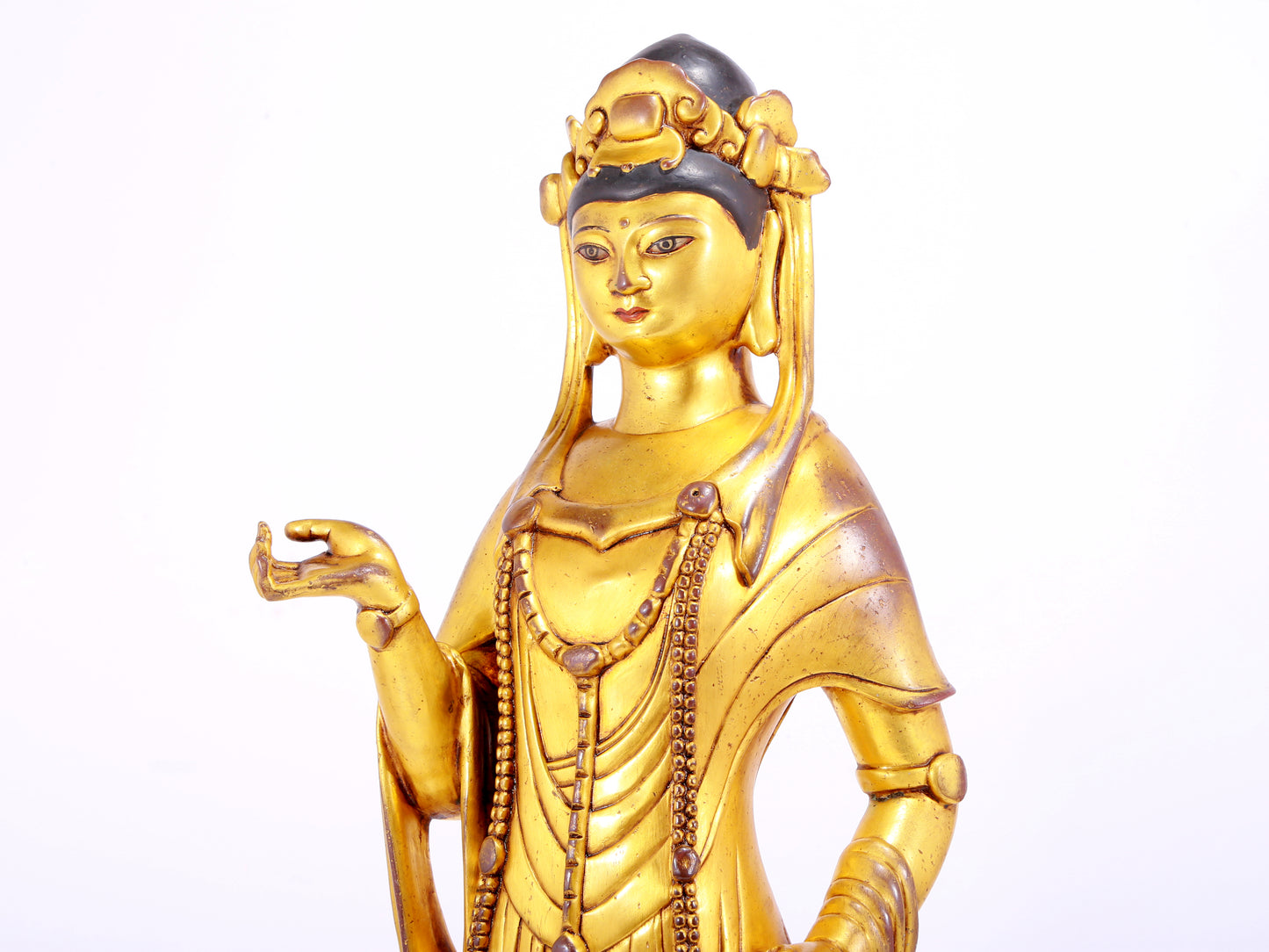 A majestic gilt bronze statue of Guanyin