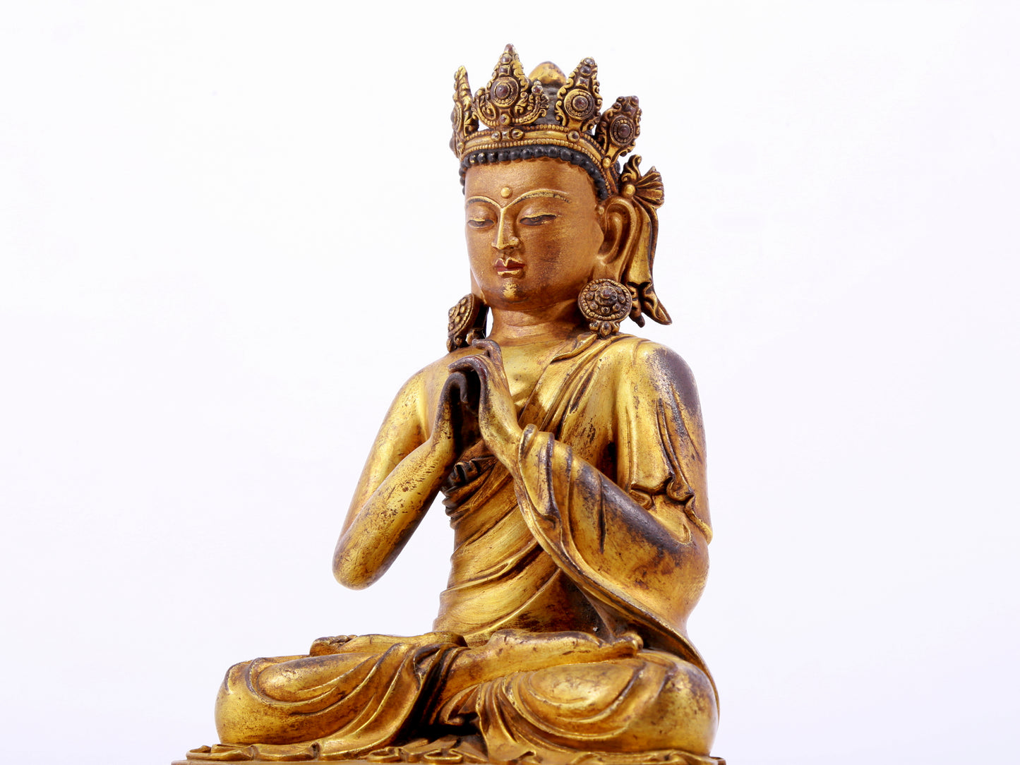 A solemn gilt bronze statue of Bodhisattva