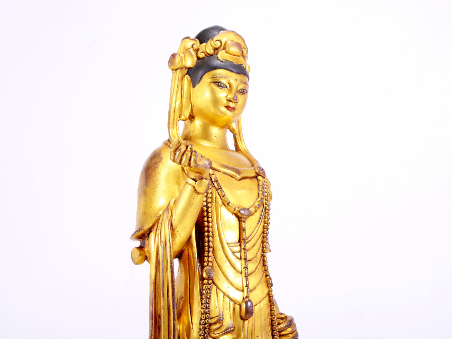 A majestic gilt bronze statue of Guanyin