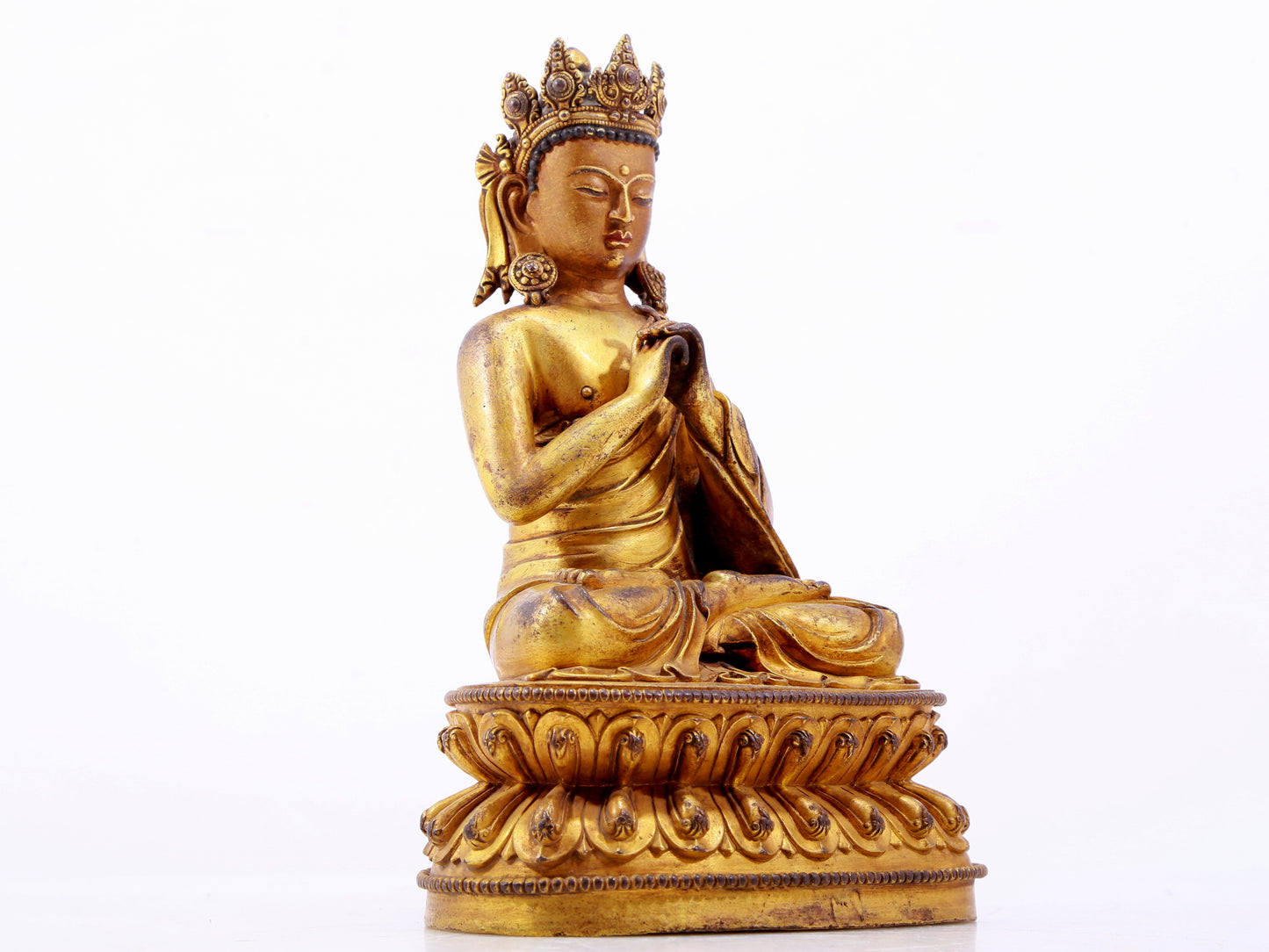 A solemn gilt bronze statue of Bodhisattva