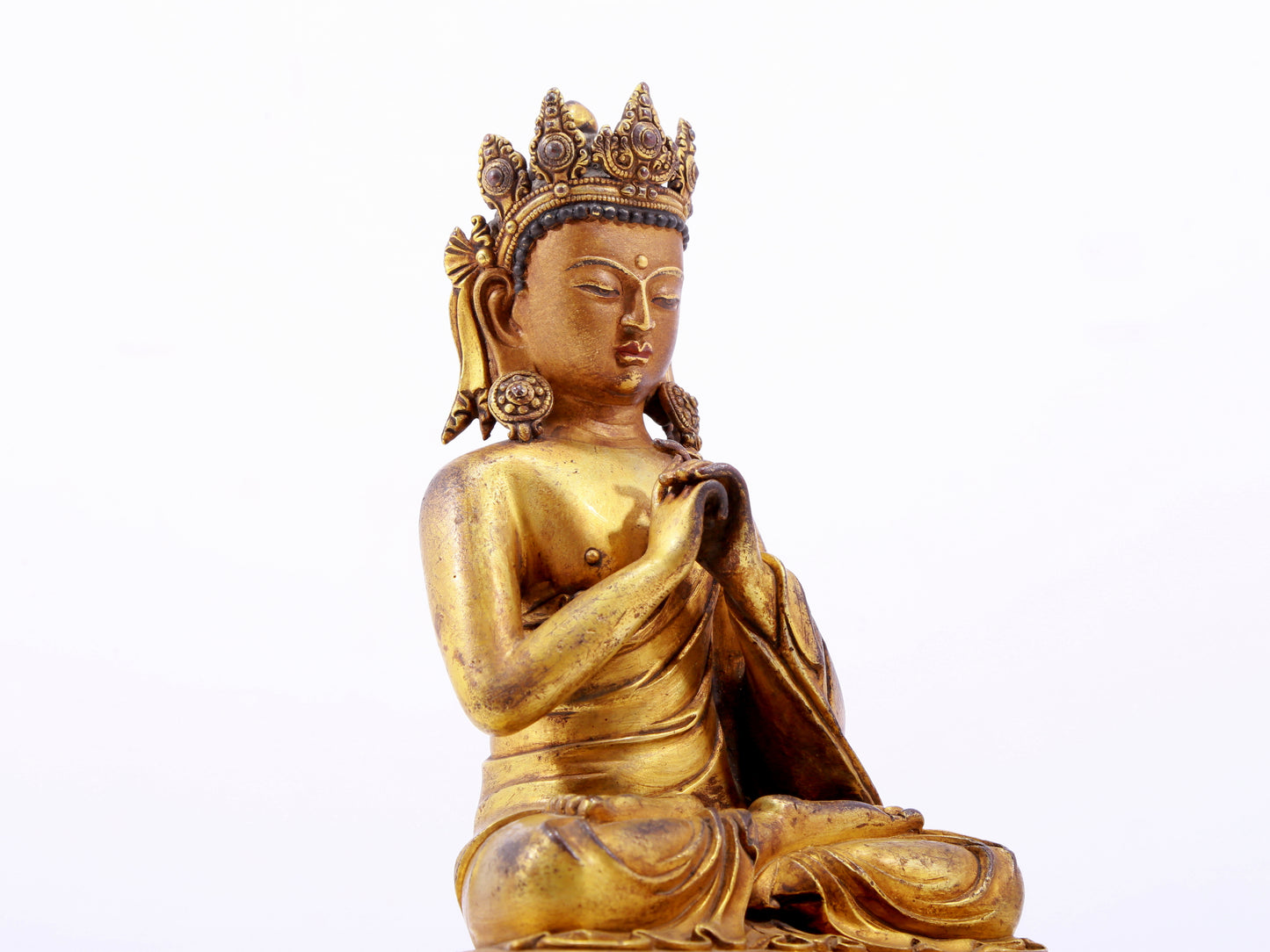 A solemn gilt bronze statue of Bodhisattva