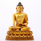 A majestic gilt bronze statue of Sakyamuni