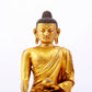 A majestic gilt bronze statue of Sakyamuni