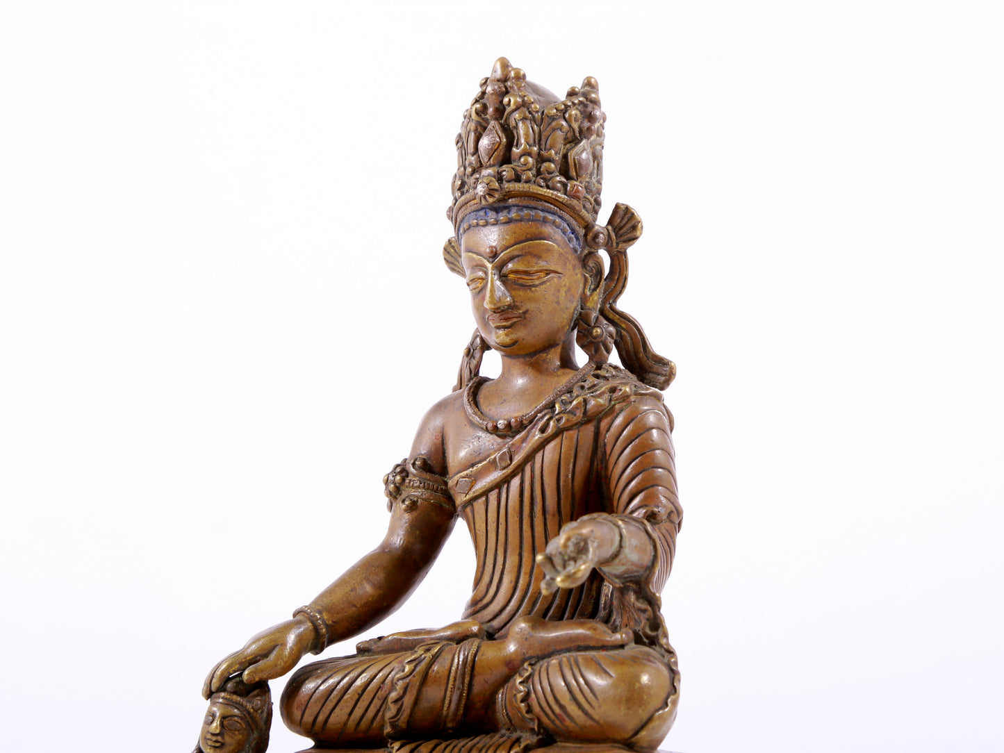 A majestic alloy copper four-armed Guanyin statue