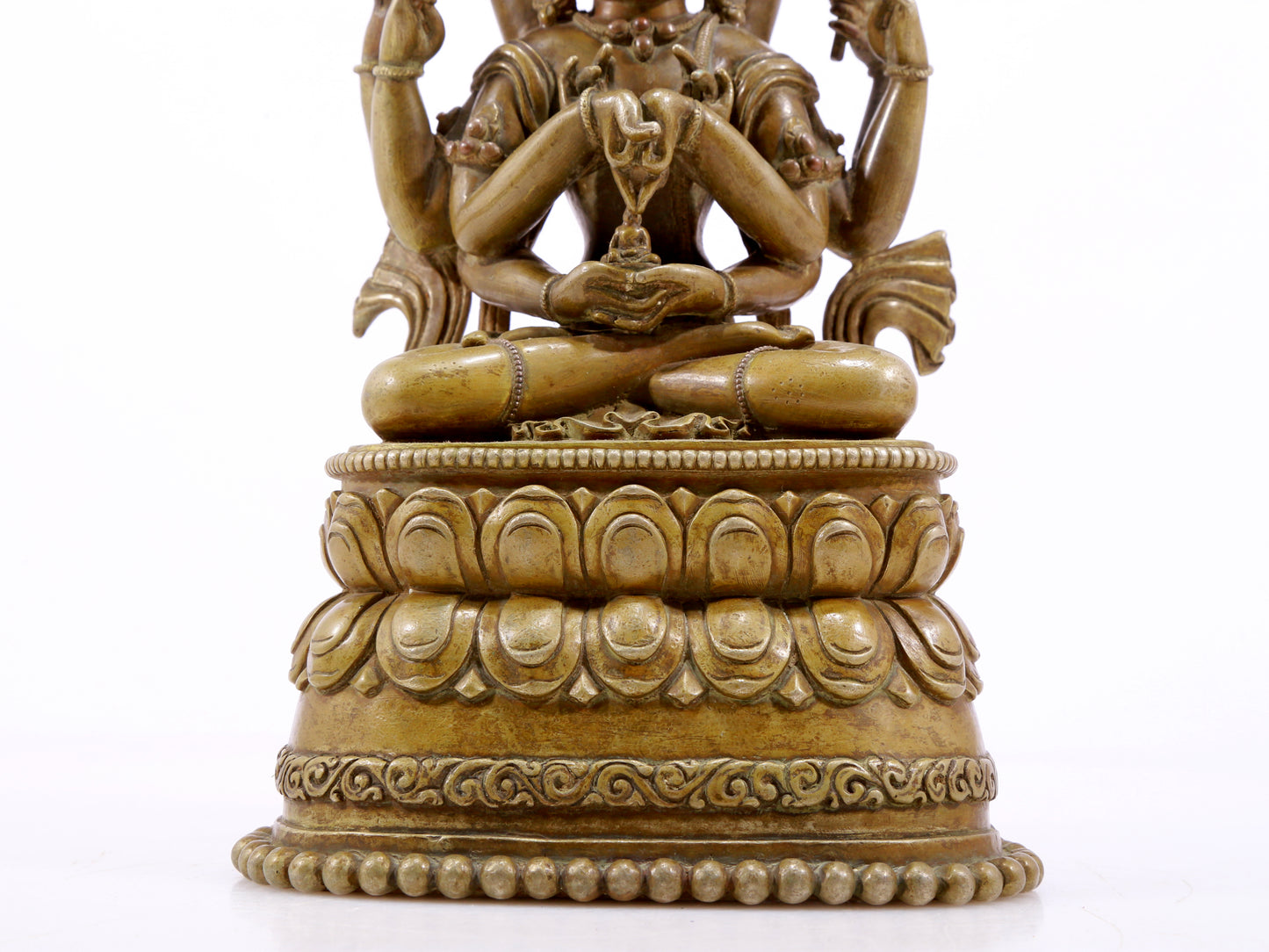 A solemn alloy copper inlaid silver eight-armed Guanyin statue