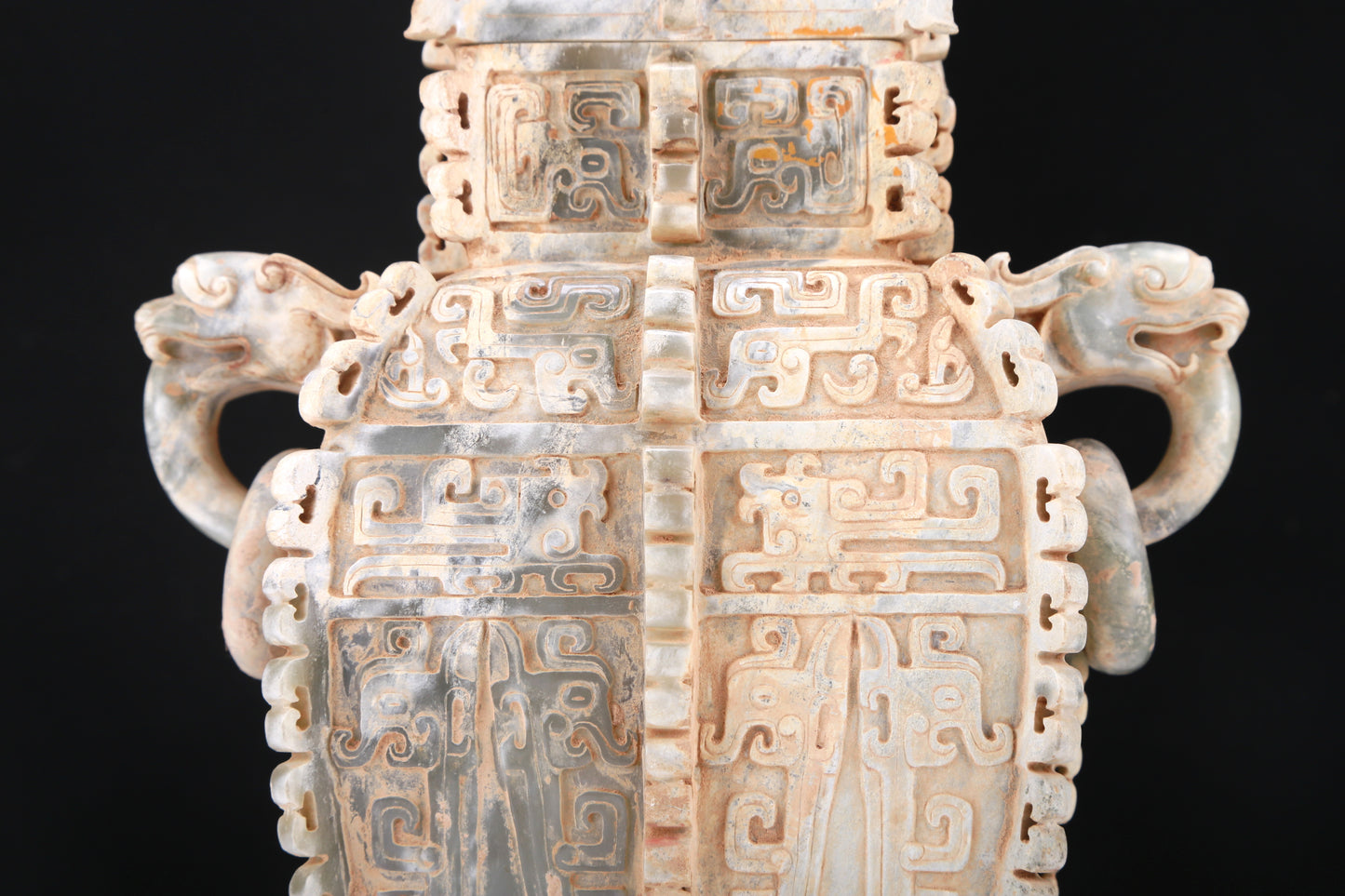 An Archaic Celadon-White Jade 'Auspicious Beast' Vase And Cover