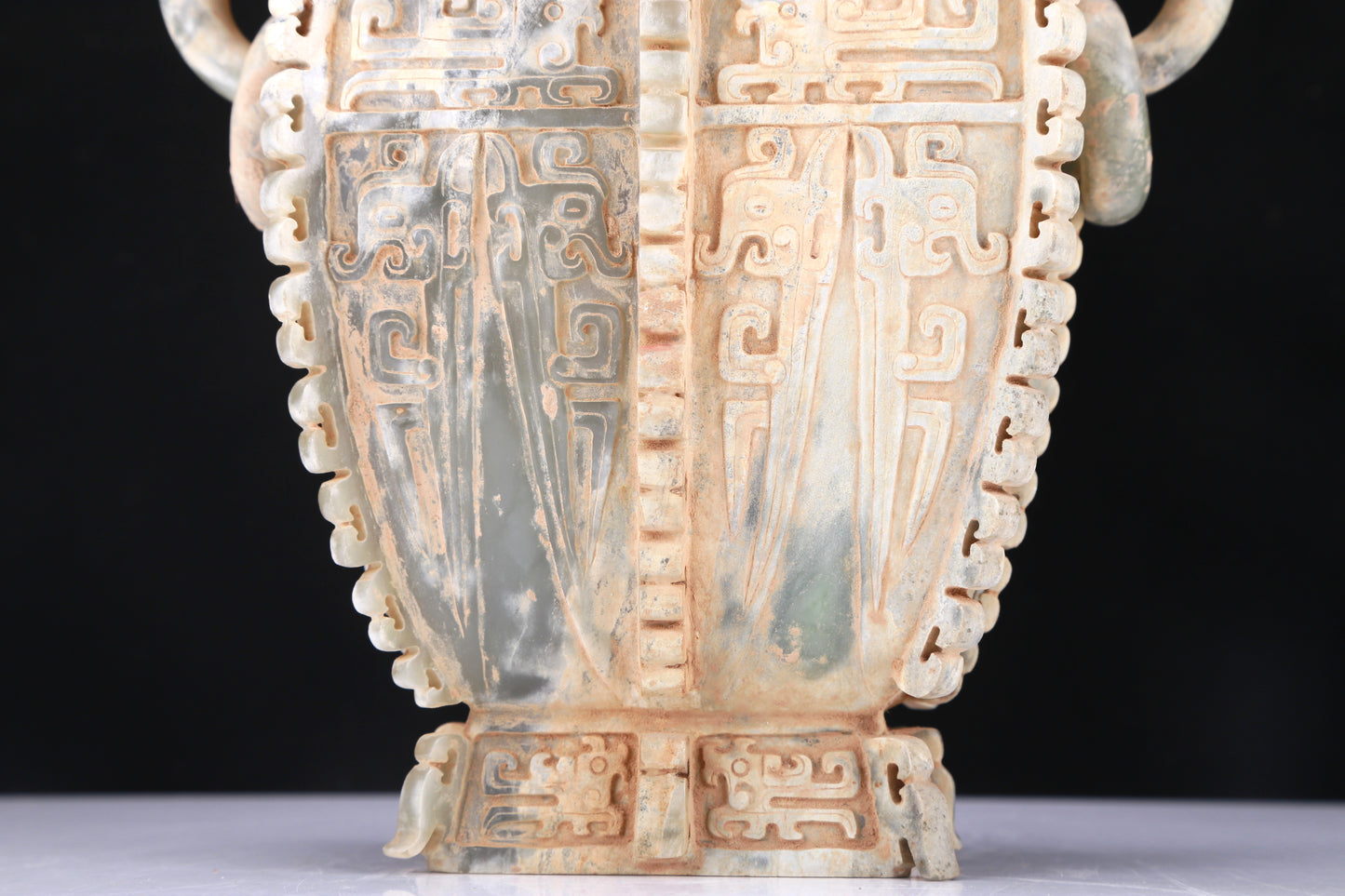 An Archaic Celadon-White Jade 'Auspicious Beast' Vase And Cover