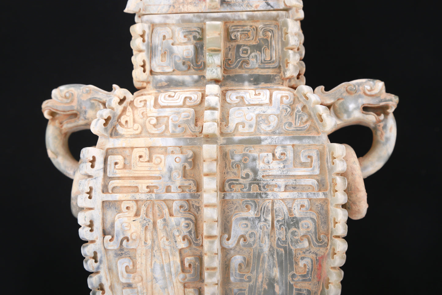 An Archaic Celadon-White Jade 'Auspicious Beast' Vase And Cover