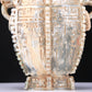 An Archaic Celadon-White Jade 'Auspicious Beast' Vase And Cover