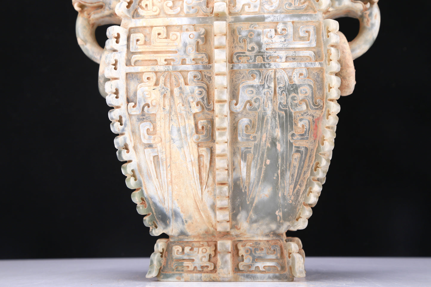 An Archaic Celadon-White Jade 'Auspicious Beast' Vase And Cover