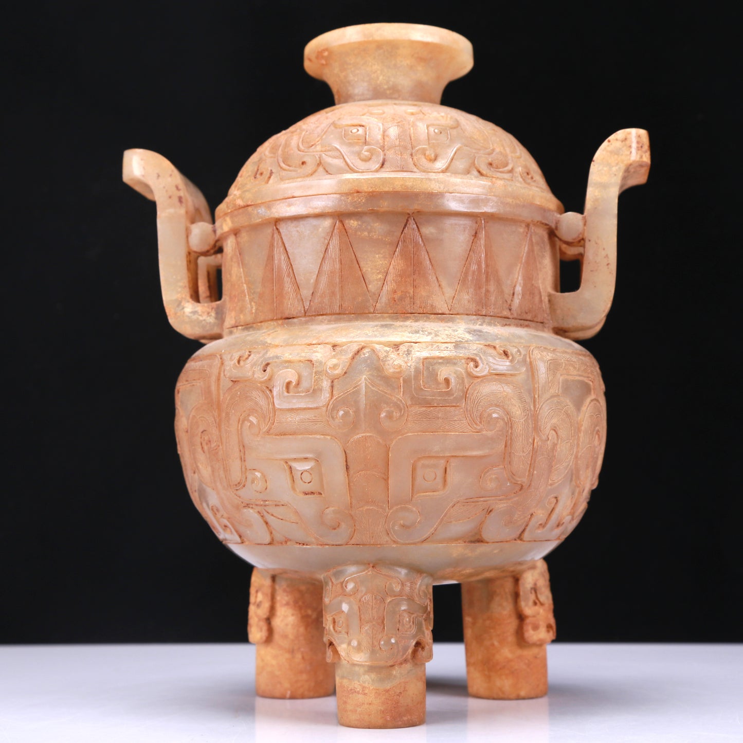 An Archaic White Jade 'Animal Mask' Tripod Censer And Cover