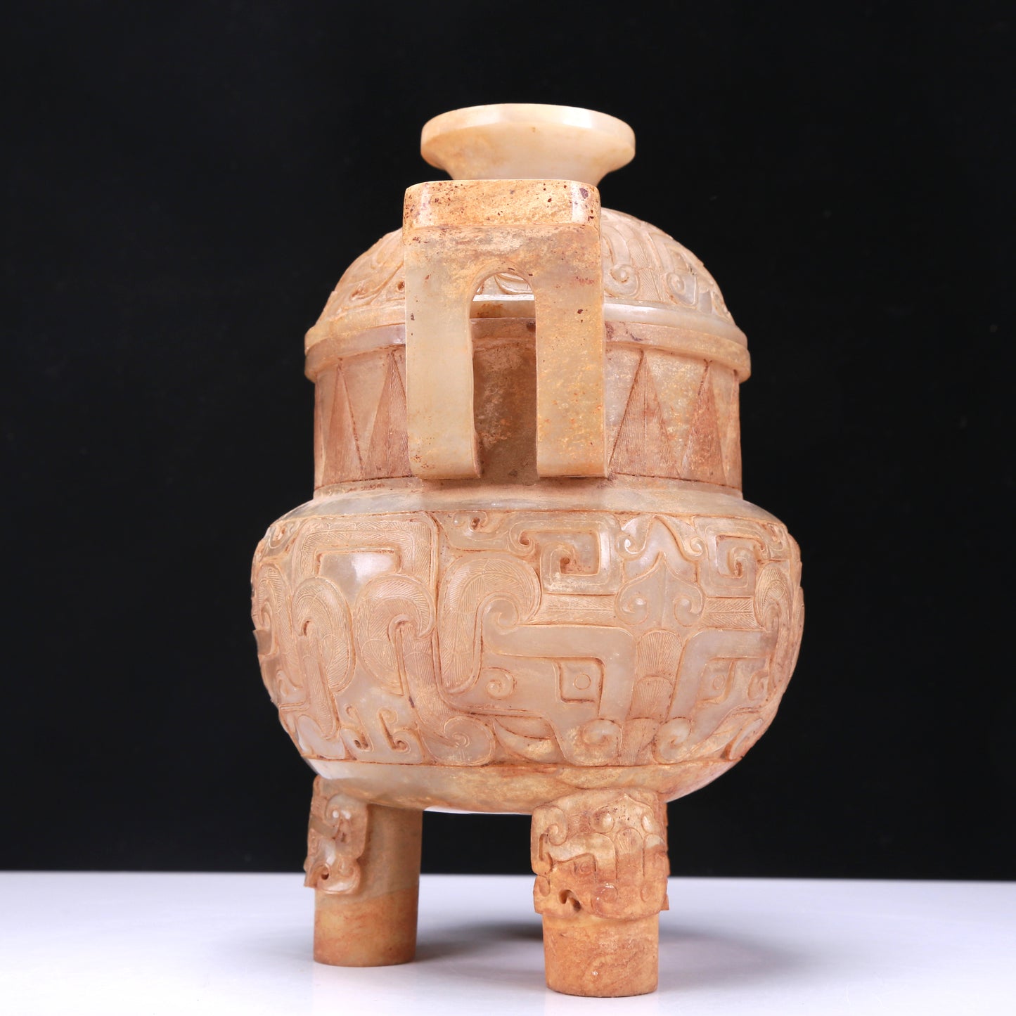 An Archaic White Jade 'Animal Mask' Tripod Censer And Cover