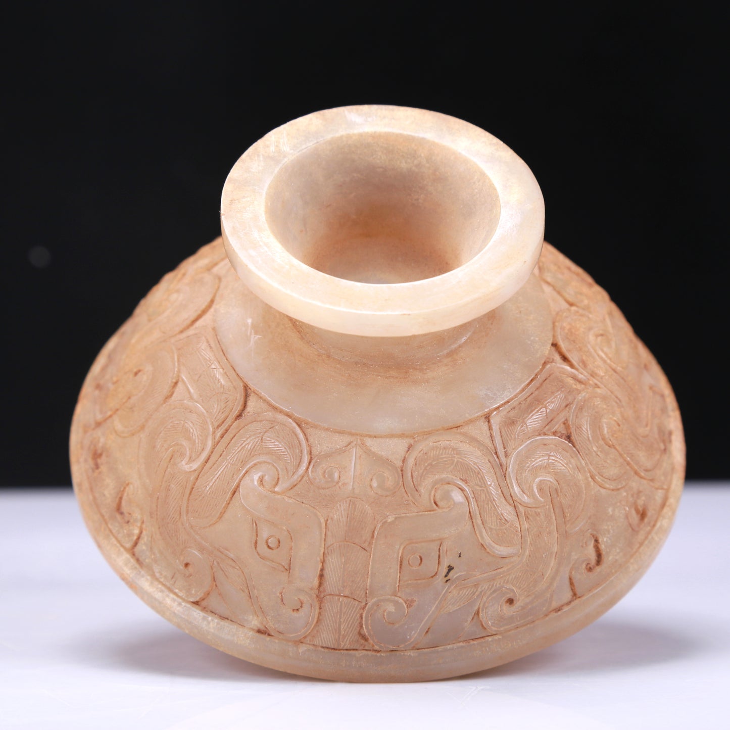 An Archaic White Jade 'Animal Mask' Tripod Censer And Cover