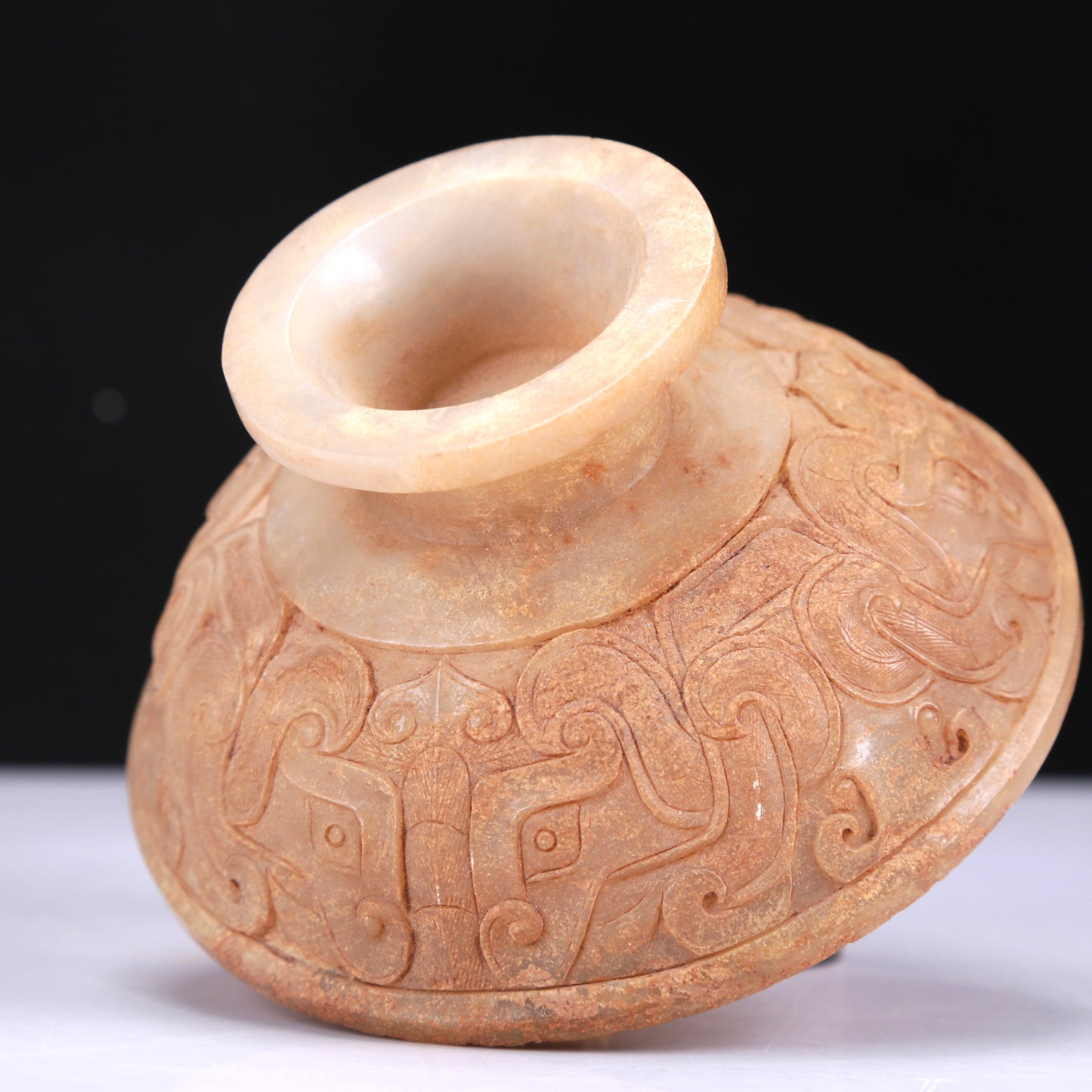 An Archaic White Jade 'Animal Mask' Tripod Censer And Cover