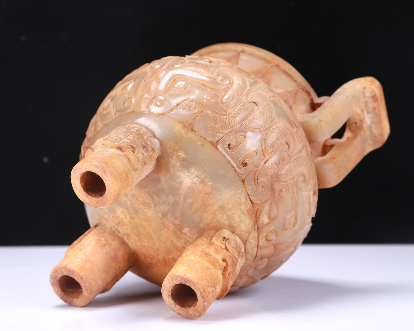 An Archaic White Jade 'Animal Mask' Tripod Censer And Cover