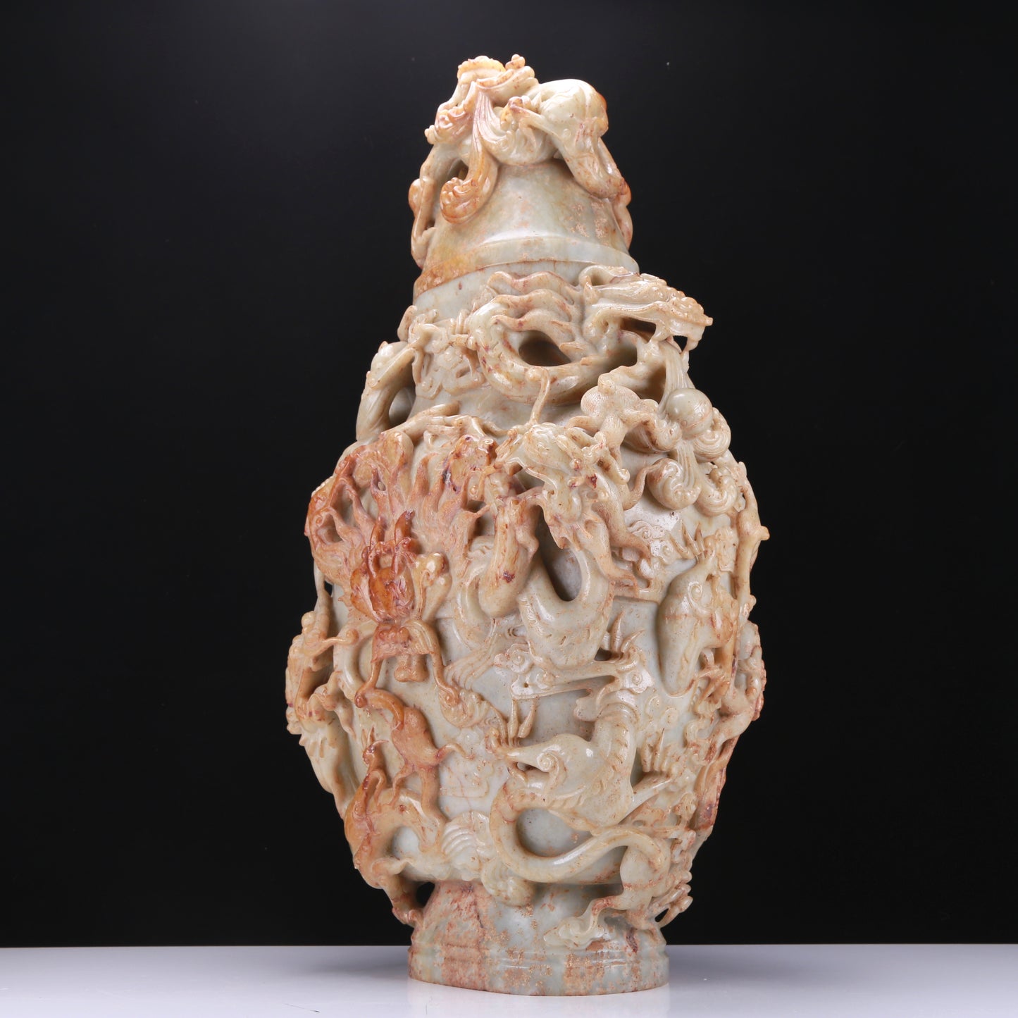 An Archaic White Jade 'Auspicious Cloud& Dragon' Vase And Cover