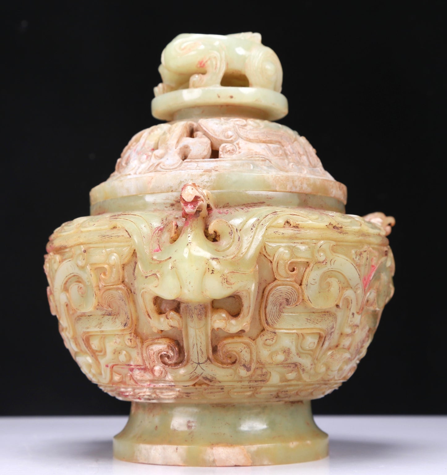 An Excellent Celadon-White Jade 'Animal Mask' Jar