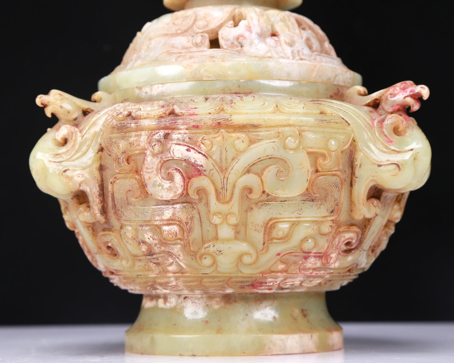 An Excellent Celadon-White Jade 'Animal Mask' Jar