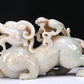 An Elaborate White Jade Auspicious Beast Group