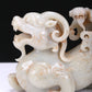 An Elaborate White Jade Auspicious Beast Group