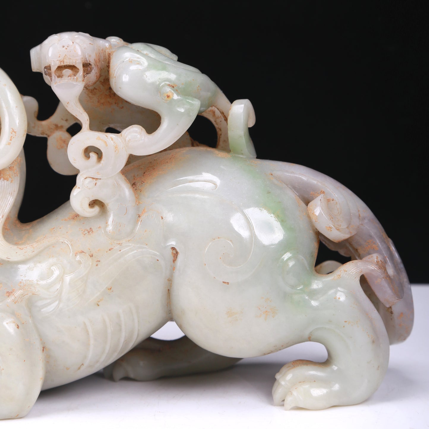 An Elaborate White Jade Auspicious Beast Group