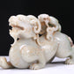 An Elaborate White Jade Auspicious Beast Group