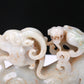 An Elaborate White Jade Auspicious Beast Group