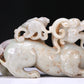 An Elaborate White Jade Auspicious Beast Group