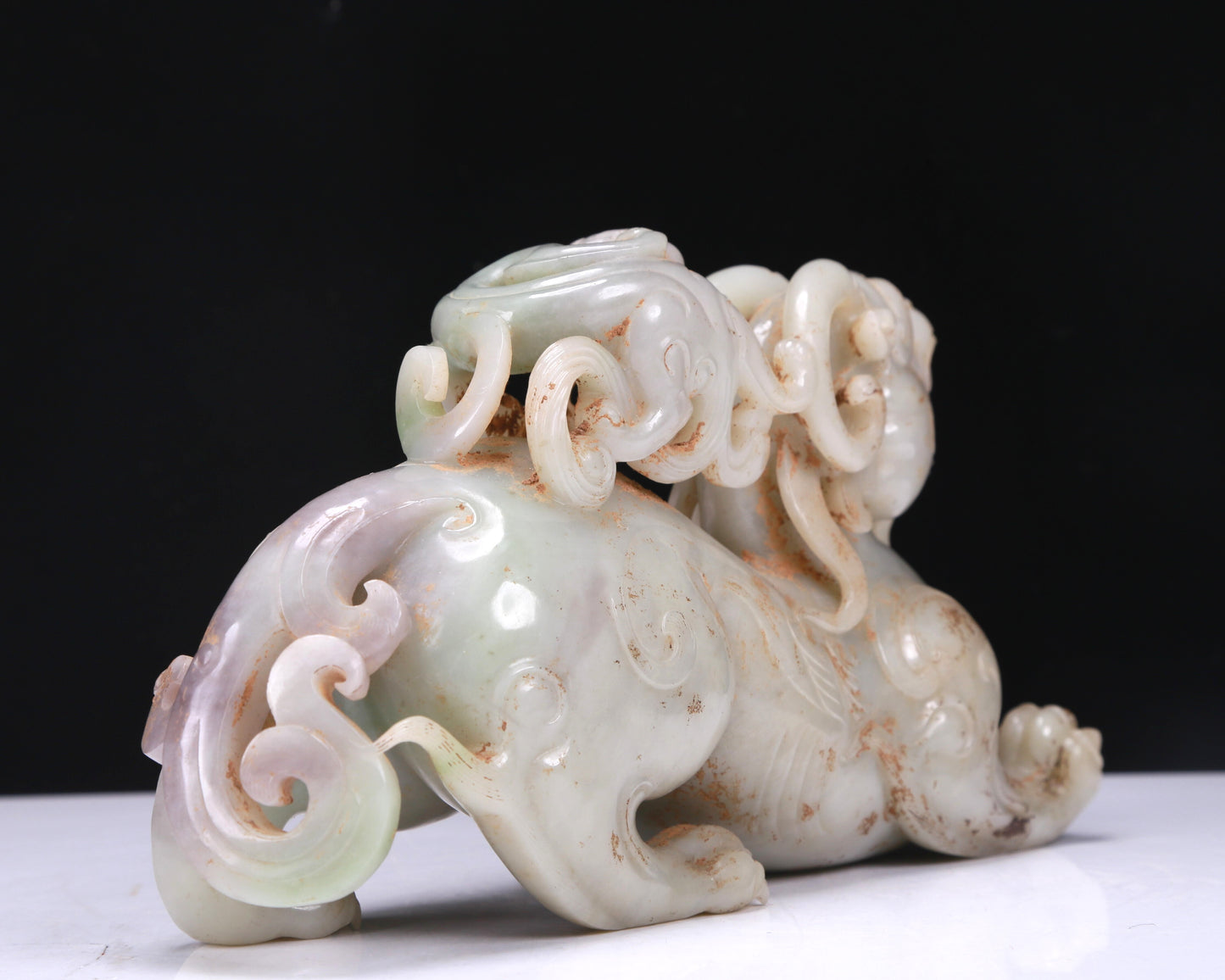 An Elaborate White Jade Auspicious Beast Group