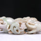 An Elaborate White Jade Auspicious Beast Group