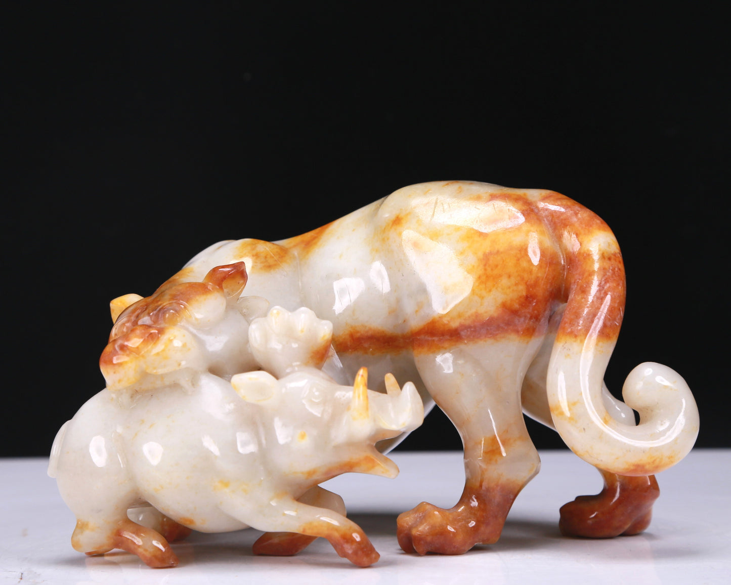 An Elaborate White Jade Auspicious Beast Group