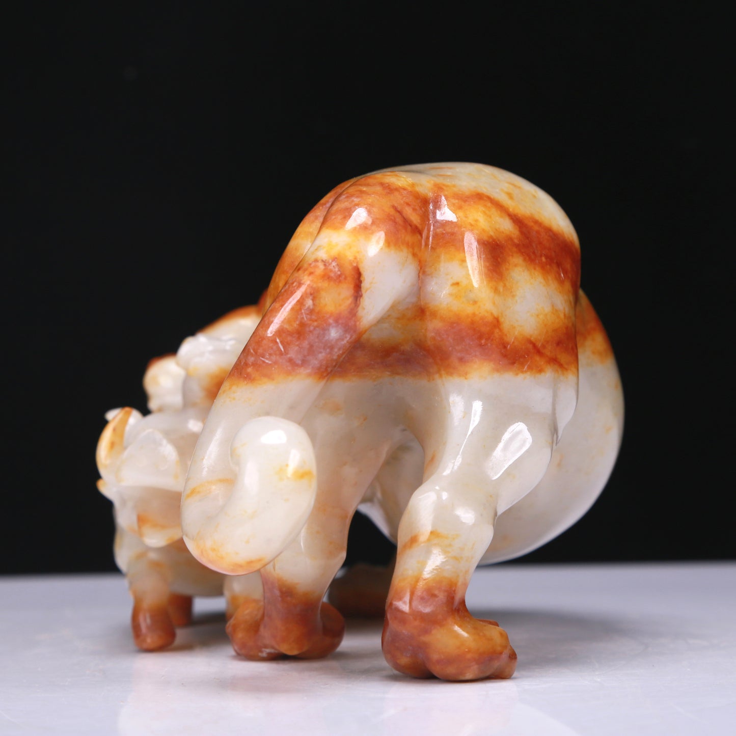 An Elaborate White Jade Auspicious Beast Group