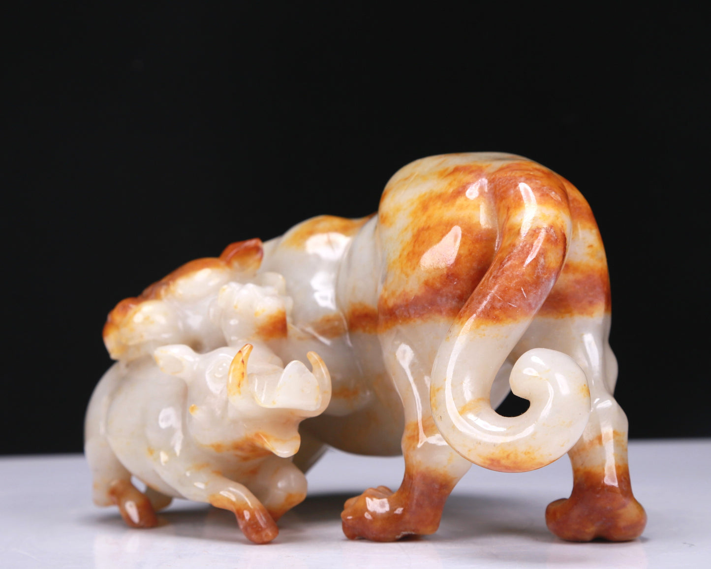 An Elaborate White Jade Auspicious Beast Group