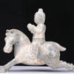 An Excellent White Jade Figure Seated On A Horse