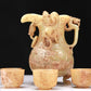 An Elaborate Yellow Jade 'Chi-Dragon' Tripod Ewer With Four 'Chi-Dragon' Cups